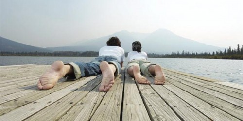 Couple relaxing together at the lake